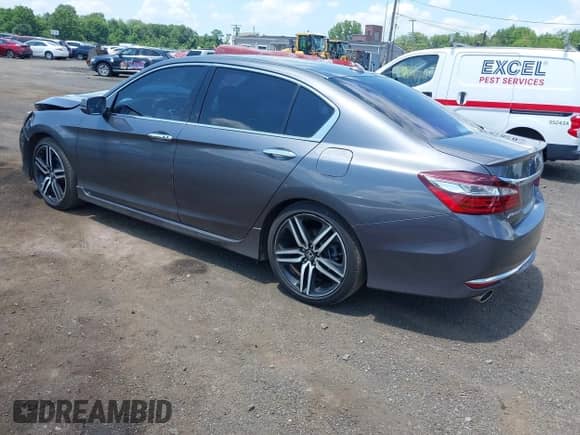 2017 Honda Accord Touring with VIN 1HGCR3F94HA002173, listed as a IAAI auction lot 42673267 with 147,086 mi miles and . Bid and sale history available at DreamBid. Image 3.