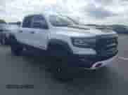 2023 Ram 1500 TRX z VIN 1C6SRFU95PN572888, wystawiony jako IAAI lot #43319141 z przebiegiem 17 078 mil mil oraz . Historia ofert i sprzedaży dostępna na DreamBid. Obrazek 1.