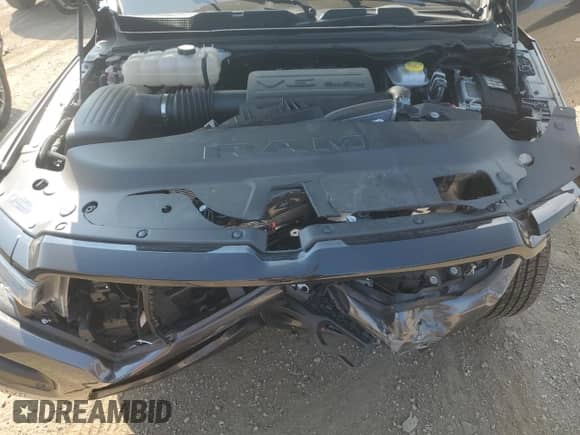 2025 Ram 1500 Tradesman with VIN 1C6RRFGG0SN646400, listed as a Copart auction lot 65794815 with 9,838 mi miles and Salvage title. Bid and sale history available at DreamBid. Image 11.