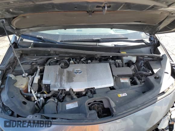 2018 Toyota Prius Plus z VIN JTDKARFP7J3086633, wystawiony jako Copart lot #82094685 z przebiegiem 275 692 mil mil oraz Szkoda całkowita • Salvage title. Historia ofert i sprzedaży dostępna na DreamBid. Obrazek 11.