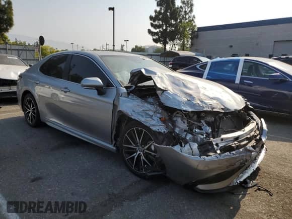 2023 Toyota Camry Hybrid SE with VIN 4T1G31AK6PU618210, listed as a Copart auction lot 64641305 with 21,685 mi miles and Salvage title. Bid and sale history available at DreamBid. Image 4.