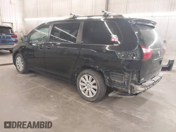 2017 Toyota Sienna LE with VIN 5TDJZ3DC2HS183619, listed as a IAAI auction lot 41905106 with 198,351 mi miles and . Bid and sale history available at DreamBid. Image 3.