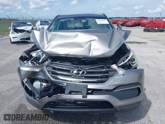 2018 Hyundai Santa Fe 2.4L with VIN 5NMZT3LB0JH053313, listed as a IAAI auction lot 42992926 with 140,803 mi miles and . Bid and sale history available at DreamBid. Image 12.