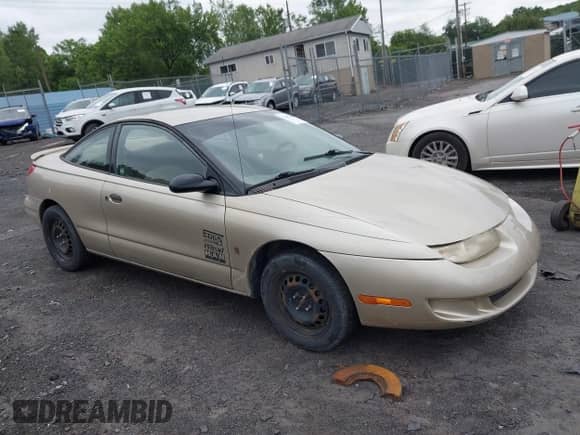1999 Saturn SC with VIN 1G8ZN1285XZ315751, listed as a IAAI auction lot 42602603 with 272,730 mi miles and . Bid and sale history available at DreamBid. Image 1.
