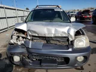 2002 Hyundai Santa Fe GLS z VIN KM8SC13D02U311312, wystawiony jako Copart lot #85943534 z przebiegiem 307 758 mil mil oraz Szkoda całkowita • Salvage title. Historia ofert i sprzedaży dostępna na DreamBid. Obrazek 5.