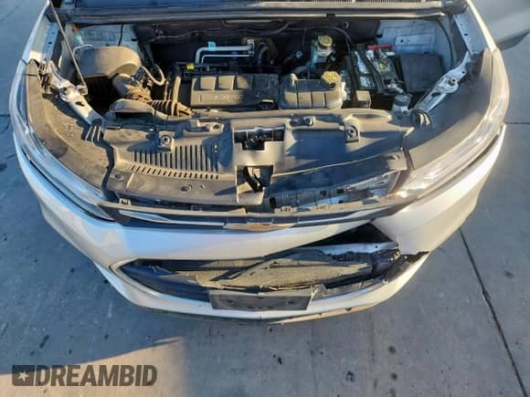 2019 Chevrolet Trax LT z VIN KL7CJLSB2KB811796, wystawiony jako Copart lot #69226525 z przebiegiem 76 131 mil mil oraz Szkoda całkowita • Salvage title. Historia ofert i sprzedaży dostępna na DreamBid. Obrazek 12.