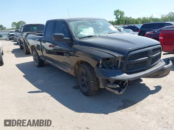 2021 Ram 1500 Express z VIN 1C6RR7FG6MS569401, wystawiony jako IAAI lot #43069535 z przebiegiem 119 087 mil mil oraz . Historia ofert i sprzedaży dostępna na DreamBid. Obrazek 1.