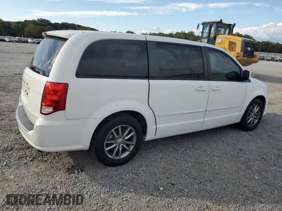 2016 Dodge Grand Caravan SE with VIN 2C4RDGBG4GR176841, listed as a Copart auction lot 82336855 with 148,270 mi miles and Clean title. Bid and sale history available at DreamBid. Image 3.