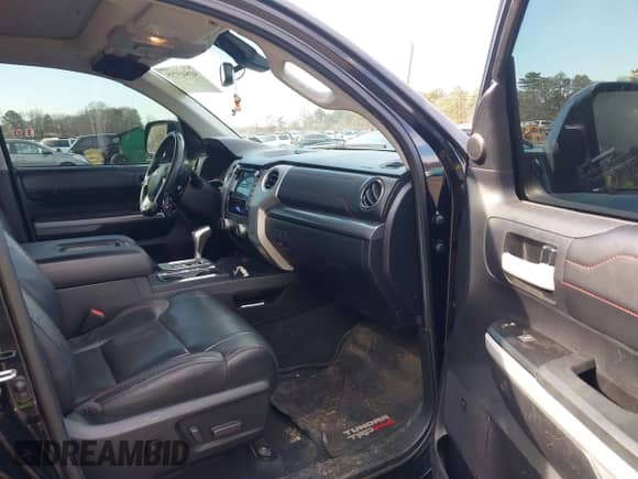 2021 Toyota Tundra SR5 with VIN 5TFDY5F10MX964425, listed as a IAAI auction lot 41843735 with 108,005 mi miles and . Bid and sale history available at DreamBid. Image 5.
