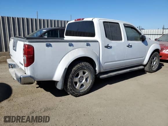 2008 Nissan Frontier SE z VIN 1N6AD07W88C428022, wystawiony jako Copart lot #76996844 z przebiegiem 226 583 mil mil oraz Czysty tytuł • Clean title. Historia ofert i sprzedaży dostępna na DreamBid. Obrazek 3.
