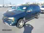 2005 Chevrolet TrailBlazer LT with VIN 1GNES16S556123626, listed as a IAAI auction lot 43418983 with 137,410 mi miles and . Bid and sale history available at DreamBid. Image 2.