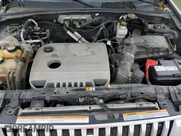 2009 Mercury Mariner Hybrid with VIN 4M2CU29379KJ13787, listed as a Copart auction lot 70720545 with 149,923 mi miles and Salvage title. Bid and sale history available at DreamBid. Image 12.