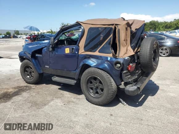 2003 Jeep Wrangler X z VIN 1J4FA39S43P357281, wystawiony jako Copart lot #67979335 z przebiegiem Nie podano mil oraz Szkoda całkowita • Salvage title. Historia ofert i sprzedaży dostępna na DreamBid. Obrazek 2.