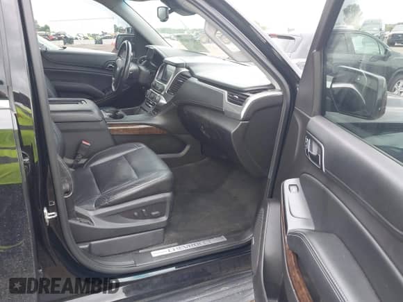 2015 Chevrolet Tahoe LT z VIN 1GNSKBKC2FR728646, wystawiony jako IAAI lot #42914435 z przebiegiem 137 284 mil mil oraz . Historia ofert i sprzedaży dostępna na DreamBid. Obrazek 5.