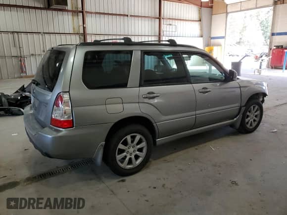 2007 Subaru Forester X z VIN JF1SG65667H717539, wystawiony jako Copart lot #90048345 z przebiegiem 202 815 mil mil oraz Czysty tytuł • Clean title. Historia ofert i sprzedaży dostępna na DreamBid. Obrazek 3.
