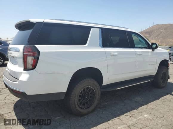 2023 Chevrolet Suburban LS z VIN 1GNSKBKD7PR459408, wystawiony jako Copart lot #66578325 z przebiegiem 24 725 mil mil oraz Szkoda całkowita • Salvage title. Historia ofert i sprzedaży dostępna na DreamBid. Obrazek 3.