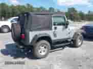 2005 Jeep Wrangler X z VIN 1J4FA39SX5P370491, wystawiony jako IAAI lot #43156077 z przebiegiem 110 362 mil mil oraz . Historia ofert i sprzedaży dostępna na DreamBid. Obrazek 4.