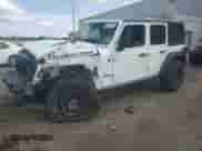 2022 Jeep Wrangler Unlimited Rubicon with VIN 1C4JJXFG6NW124065, listed as a Copart auction lot 67817425 with 60,324 mi miles and Salvage title. Bid and sale history available at DreamBid. Image 1.