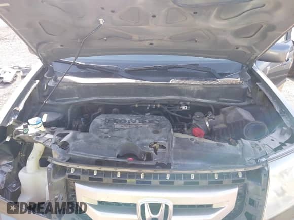 2010 Honda Pilot Touring with VIN 5FNYF4H88AB012001, listed as a IAAI auction lot 42635771 with 287,115 mi miles and . Bid and sale history available at DreamBid. Image 10.