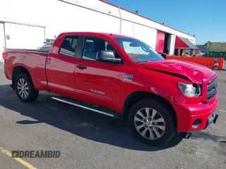 2010 Toyota Tundra with VIN 5TFUY5F14AX113451, listed as a IAAI auction lot 43309497 with 153,046 mi miles and . Bid and sale history available at DreamBid. Image 1.