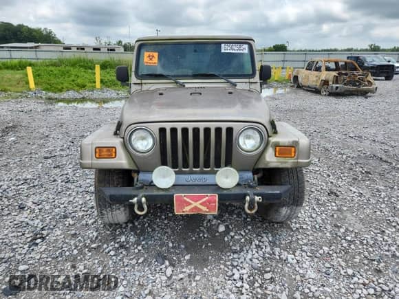 2003 Jeep Wrangler Sahara с VIN 1J4FA59S53P326956, выставлен на аукционе Copart как лот 62502585 с пробегом Не указан миль и Чистый • Clean title. История ставок и продаж доступна на DreamBid. Изображение 5.