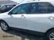 2018 Chevrolet Equinox Premier with VIN 2GNAXWEX8J6134036, listed as a IAAI auction lot 43130152 with 122,458 mi miles and . Bid and sale history available at DreamBid. Image 14.