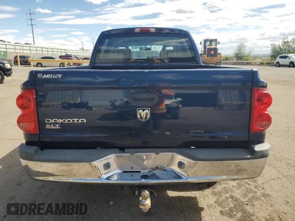 2006 Dodge Dakota SLT with VIN 1D7HW48K26S704816, listed as a Copart auction lot 56071985 with 105,189 mi miles and Salvage title. Bid and sale history available at DreamBid. Image 6.