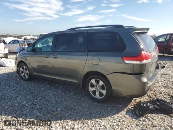 2012 Toyota Sienna LE with VIN 5TDKK3DC4CS179802, listed as a Copart auction lot 84264155 with 241,326 mi miles and Clean title. Bid and sale history available at DreamBid. Image 2.