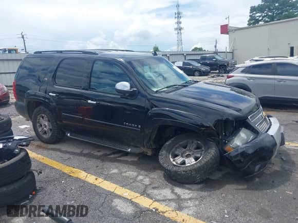 2007 Chevrolet Tahoe LT with VIN 1GNFC13037R423235, listed as a IAAI auction lot 42992915 with 148,780 mi miles and . Bid and sale history available at DreamBid. Image 13.