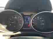 2013 Hyundai Veloster w/Black Int с VIN KMHTC6AD0DU166697, выставлен на аукционе Copart как лот 71646805 с пробегом 158 640 миль миль и Списание • Salvage title. История ставок и продаж доступна на DreamBid. Изображение 9.