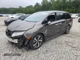 2018 Honda Odyssey Elite с VIN 5FNRL6H96JB059108, выставлен на аукционе Copart как лот 69909385 с пробегом Не указан миль и Списание • Salvage title. История ставок и продаж доступна на DreamBid. Изображение 1.