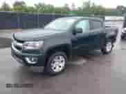 2015 Chevrolet Colorado 2WD LT z VIN 1GCGSBEAXF1181262, wystawiony jako IAAI lot #42418456 z przebiegiem 137 819 mil mil oraz . Historia ofert i sprzedaży dostępna na DreamBid. Obrazek 2.