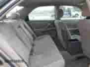 2001 Toyota Camry LE z VIN 4T1BG22K91U083996, wystawiony jako IAAI lot #43422068 z przebiegiem 256 386 mil mil oraz . Historia ofert i sprzedaży dostępna na DreamBid. Obrazek 8.