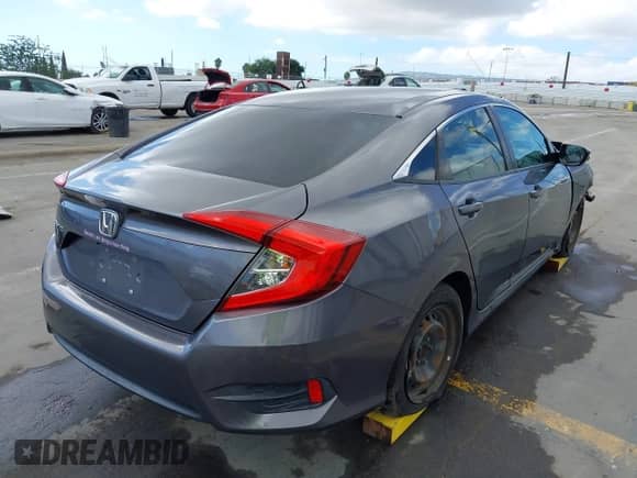 2016 Honda Civic LX z VIN 19XFC2F57GE204070, wystawiony jako IAAI lot #43375917 z przebiegiem 172 565 mil mil oraz . Historia ofert i sprzedaży dostępna na DreamBid. Obrazek 4.