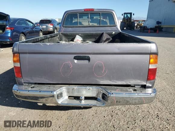 1997 Toyota Tacoma z VIN 4TAVN52N2VZ297347, wystawiony jako Copart lot #89669695 z przebiegiem 218 489 mil mil oraz Szkoda całkowita • Salvage title. Historia ofert i sprzedaży dostępna na DreamBid. Obrazek 6.