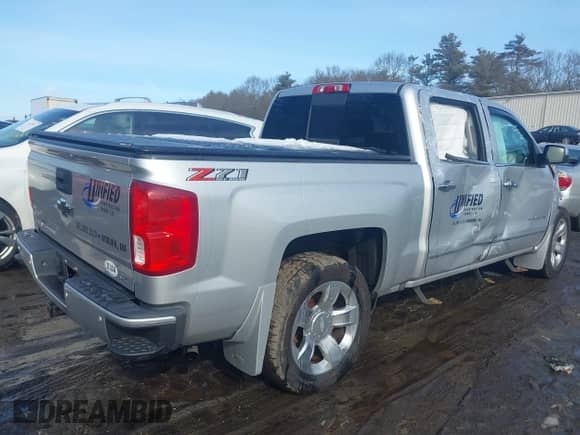 2018 Chevrolet Silverado 1500 LTZ z VIN 3GCUKSECXJG536316, wystawiony jako IAAI lot #41432469 z przebiegiem 127 276 mil mil oraz . Historia ofert i sprzedaży dostępna na DreamBid. Obrazek 4.