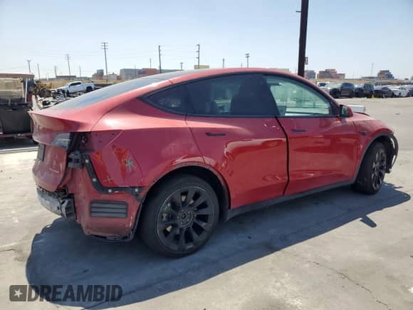 2023 Tesla Model Y Long Range with VIN 7SAYGDEE3PF629096, listed as a Copart auction lot 62891715 with 72,872 mi miles and Salvage title. Bid and sale history available at DreamBid. Image 3.