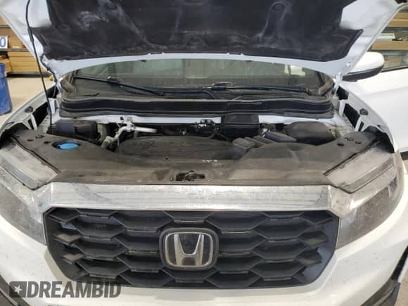 2022 Honda Passport EX-L with VIN 5FNYF8H56NB003932, listed as a Copart auction lot 57431605 with 74,842 mi miles and Salvage title. Bid and sale history available at DreamBid. Image 12.