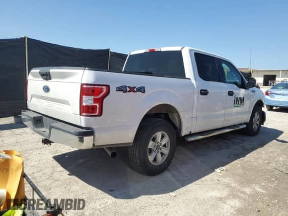 2018 Ford F-150 XL with VIN 1FTEW1E5XJFC55400, listed as a Copart auction lot 71768395 with 121,067 mi miles and Salvage title. Bid and sale history available at DreamBid. Image 3.