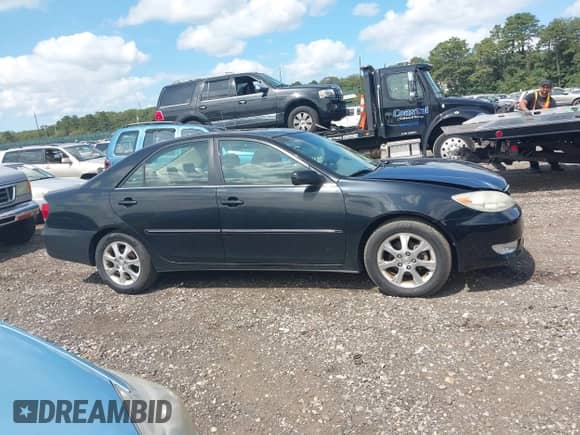 2005 Toyota Camry LE with VIN 4T1BE30K55U061563, listed as a IAAI auction lot 43179072 with 118,381 mi miles and . Bid and sale history available at DreamBid. Image 13.