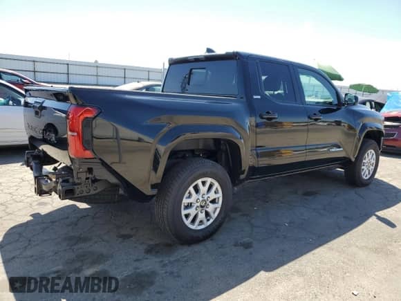 2024 Toyota Tacoma SR5 with VIN 3TMLB5JNXRM054298, listed as a Copart auction lot 66528135 with 5,976 mi miles and Salvage title. Bid and sale history available at DreamBid. Image 3.