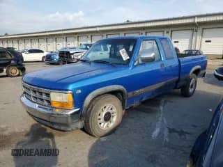 1992 Dodge Dakota with VIN 1B7GL23Y6NS585763, listed as a Copart auction lot 64827975 with 245,063 mi miles and Salvage title. Bid and sale history available at DreamBid. Image 1.