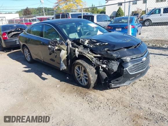 2018 Chevrolet Malibu LT z VIN 1G1ZD5ST7JF145740, wystawiony jako IAAI lot #43370388 z przebiegiem 94 051 mil mil oraz . Historia ofert i sprzedaży dostępna na DreamBid. Obrazek 1.