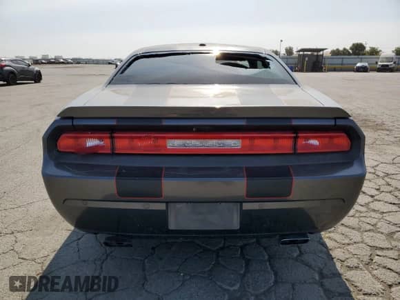 2014 Dodge Challenger R/T с VIN 2C3CDYBT4EH302454, выставлен на аукционе Copart как лот 62146085 с пробегом 110 553 миль миль и Списание • Salvage title. История ставок и продаж доступна на DreamBid. Изображение 6.