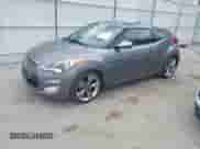 2013 Hyundai Veloster w/Black Int z VIN KMHTC6AD3DU118515, wystawiony jako IAAI lot #43223223 z przebiegiem 109 568 mil mil oraz . Historia ofert i sprzedaży dostępna na DreamBid. Obrazek 2.