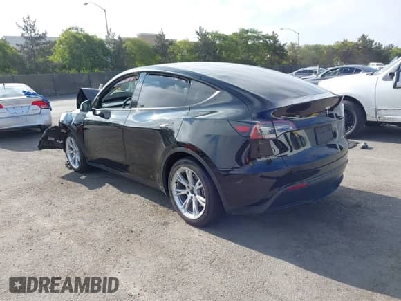 2023 Tesla Model Y Long Range с VIN 7SAYGAEE1PF594220, выставлен на аукционе IAAI как лот 42885301 с пробегом 94 878 миль миль и . История ставок и продаж доступна на DreamBid. Изображение 3.