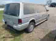 1991 Dodge Grand Caravan with VIN 1B4GK54R6MX632977, listed as a IAAI auction lot 42063934 with 130,812 mi miles and . Bid and sale history available at DreamBid. Image 4.