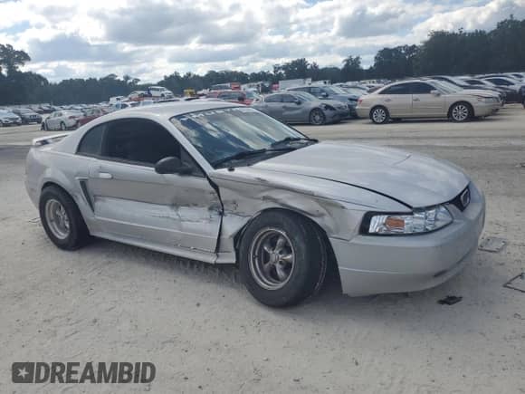 2003 Ford Mustang Standard z VIN 1FAFP40453F317652, wystawiony jako Copart lot #82534525 z przebiegiem 190 003 mil mil oraz Szkoda całkowita • Salvage title. Historia ofert i sprzedaży dostępna na DreamBid. Obrazek 4.