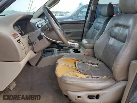 2004 Jeep Grand Cherokee with VIN 1J8GX58J54C121513, listed as a Copart auction lot 59384005 with 221,397 mi miles and Salvage title. Bid and sale history available at DreamBid. Image 7.