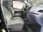 2011 Toyota Sienna LE с VIN 5TDKK3DC7BS010324, выставлен на аукционе Copart как лот 80947105 с пробегом 190 567 миль миль и Списание • Salvage title. История ставок и продаж доступна на DreamBid. Изображение 7.